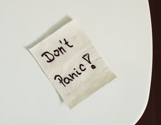 A don-t panic text on toilet paper